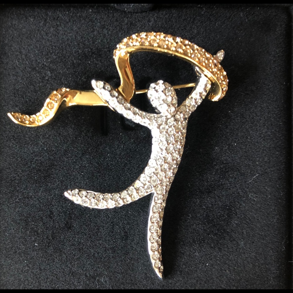 Swarovski 2000 Celebrate the Spirit “Joy” pin.